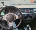 Черный Мицубиси Лансер, объемом двигателя 2 л и пробегом 300 тыс. км за 3200 $, фото 9 на Automoto.ua