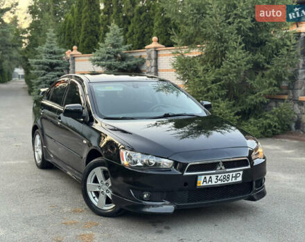 Черный Мицубиси Лансер, объемом двигателя 2 л и пробегом 145 тыс. км за 7300 $, фото 6 на Automoto.ua