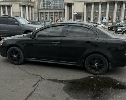 Черный Мицубиси Лансер, объемом двигателя 1.5 л и пробегом 300 тыс. км за 5800 $, фото 4 на Automoto.ua