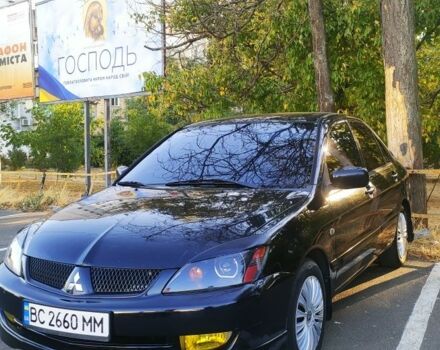 Чорний Міцубісі Lancer, об'ємом двигуна 1.6 л та пробігом 221 тис. км за 4600 $, фото 7 на Automoto.ua