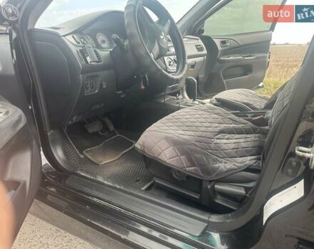 Чорний Міцубісі Lancer, об'ємом двигуна 1.6 л та пробігом 310 тис. км за 5100 $, фото 4 на Automoto.ua