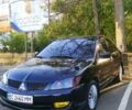 Чорний Міцубісі Lancer, об'ємом двигуна 1.6 л та пробігом 221 тис. км за 4600 $, фото 7 на Automoto.ua