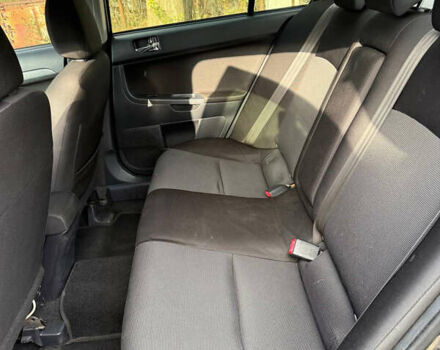 Черный Мицубиси Лансер, объемом двигателя 2 л и пробегом 219 тыс. км за 6400 $, фото 17 на Automoto.ua