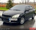 Чорний Міцубісі Lancer, об'ємом двигуна 1.6 л та пробігом 196 тис. км за 3900 $, фото 1 на Automoto.ua