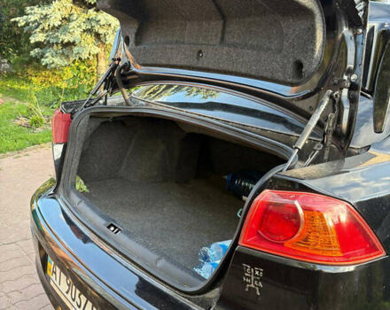 Черный Мицубиси Лансер, объемом двигателя 1.5 л и пробегом 111 тыс. км за 7500 $, фото 11 на Automoto.ua