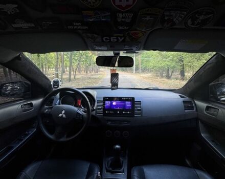 Черный Мицубиси Лансер, объемом двигателя 2 л и пробегом 280 тыс. км за 6800 $, фото 5 на Automoto.ua