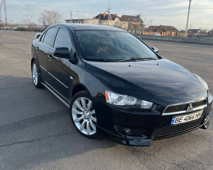 Черный Мицубиси Лансер, объемом двигателя 2 л и пробегом 193 тыс. км за 7500 $, фото 5 на Automoto.ua