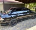 Чорний Міцубісі Lancer, об'ємом двигуна 2 л та пробігом 202 тис. км за 6300 $, фото 2 на Automoto.ua