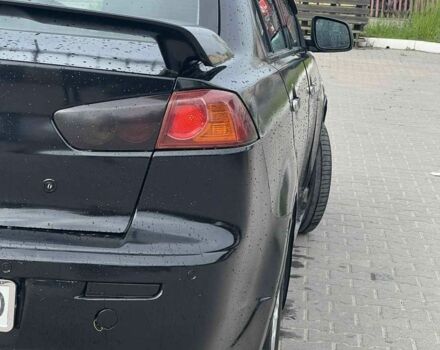 Черный Мицубиси Лансер, объемом двигателя 2 л и пробегом 350 тыс. км за 4299 $, фото 4 на Automoto.ua