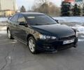Черный Мицубиси Лансер, объемом двигателя 2 л и пробегом 230 тыс. км за 6800 $, фото 1 на Automoto.ua