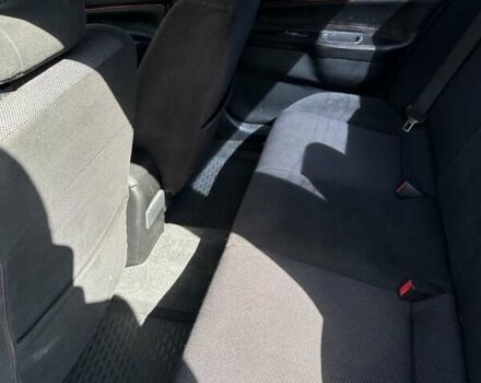 Черный Мицубиси Лансер, объемом двигателя 2 л и пробегом 272 тыс. км за 5514 $, фото 13 на Automoto.ua