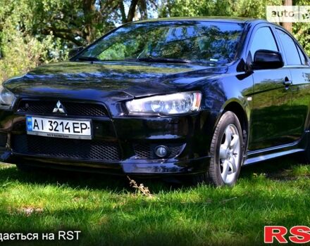 Чорний Міцубісі Lancer, об'ємом двигуна 1.8 л та пробігом 226 тис. км за 6600 $, фото 3 на Automoto.ua