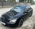 Черный Мицубиси Лансер, объемом двигателя 1.6 л и пробегом 290 тыс. км за 3200 $, фото 1 на Automoto.ua