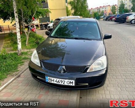 Чорний Міцубісі Lancer, об'ємом двигуна 1.6 л та пробігом 1 тис. км за 4300 $, фото 3 на Automoto.ua