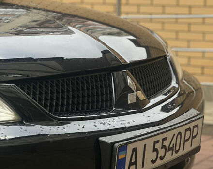 Черный Мицубиси Лансер, объемом двигателя 1.6 л и пробегом 211 тыс. км за 5700 $, фото 12 на Automoto.ua