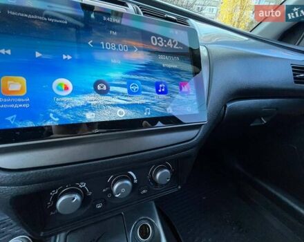 Черный Мицубиси Лансер, объемом двигателя 2 л и пробегом 280 тыс. км за 5400 $, фото 13 на Automoto.ua