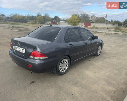 Чорний Міцубісі Lancer, об'ємом двигуна 1.6 л та пробігом 162 тис. км за 4650 $, фото 5 на Automoto.ua