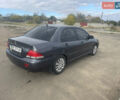 Чорний Міцубісі Lancer, об'ємом двигуна 1.6 л та пробігом 162 тис. км за 4650 $, фото 5 на Automoto.ua