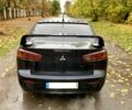 Черный Мицубиси Лансер, объемом двигателя 2 л и пробегом 280 тыс. км за 4600 $, фото 3 на Automoto.ua