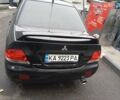 Черный Мицубиси Лансер, объемом двигателя 1.58 л и пробегом 180 тыс. км за 4500 $, фото 3 на Automoto.ua