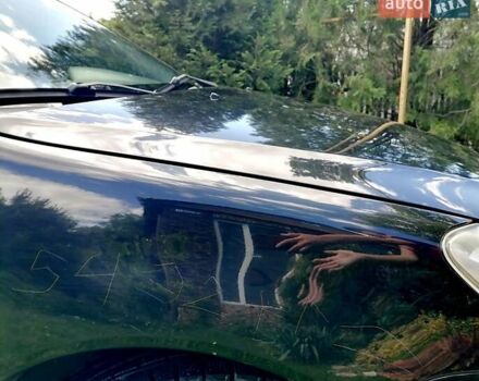 Черный Мицубиси Лансер, объемом двигателя 1.58 л и пробегом 200 тыс. км за 4000 $, фото 4 на Automoto.ua