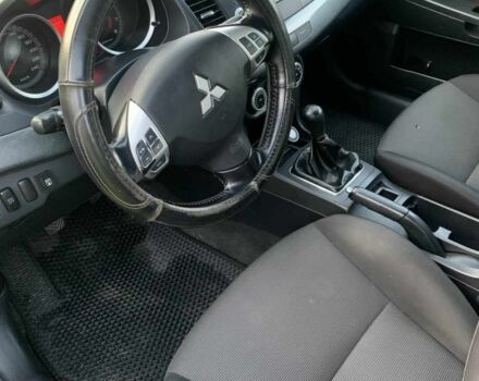 Черный Мицубиси Лансер, объемом двигателя 2 л и пробегом 208 тыс. км за 4300 $, фото 2 на Automoto.ua