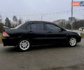 Чорний Міцубісі Lancer, об'ємом двигуна 1.6 л та пробігом 303 тис. км за 4350 $, фото 11 на Automoto.ua