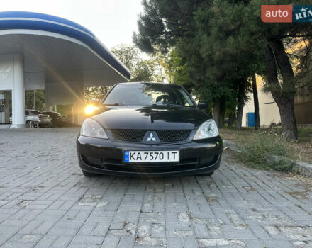 Черный Мицубиси Лансер, объемом двигателя 1.59 л и пробегом 269 тыс. км за 4999 $, фото 2 на Automoto.ua
