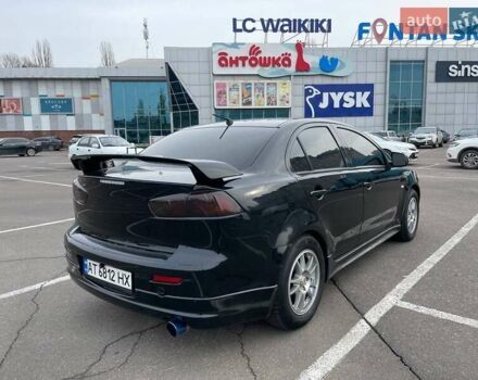 Черный Мицубиси Лансер, объемом двигателя 2 л и пробегом 246 тыс. км за 7500 $, фото 5 на Automoto.ua