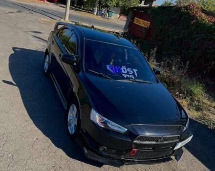 Чорний Міцубісі Lancer, об'ємом двигуна 2 л та пробігом 226 тис. км за 7200 $, фото 12 на Automoto.ua