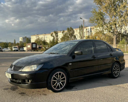 Чорний Міцубісі Lancer, об'ємом двигуна 2 л та пробігом 280 тис. км за 4600 $, фото 6 на Automoto.ua