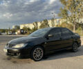 Чорний Міцубісі Lancer, об'ємом двигуна 2 л та пробігом 280 тис. км за 4600 $, фото 6 на Automoto.ua