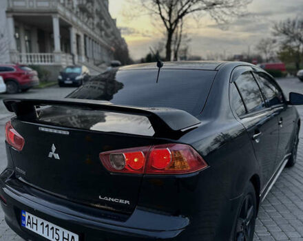 Черный Мицубиси Лансер, объемом двигателя 2 л и пробегом 245 тыс. км за 6200 $, фото 11 на Automoto.ua