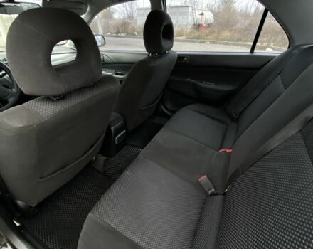 Черный Мицубиси Лансер, объемом двигателя 1.6 л и пробегом 263 тыс. км за 2900 $, фото 10 на Automoto.ua