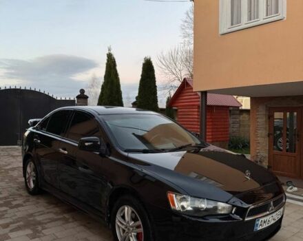 Черный Мицубиси Лансер, объемом двигателя 2 л и пробегом 247 тыс. км за 4700 $, фото 1 на Automoto.ua