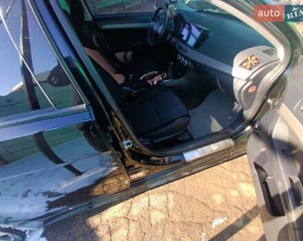 Чорний Міцубісі Lancer, об'ємом двигуна 2 л та пробігом 202 тис. км за 7800 $, фото 5 на Automoto.ua