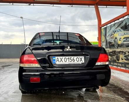 Чорний Міцубісі Lancer, об'ємом двигуна 1.6 л та пробігом 220 тис. км за 4200 $, фото 1 на Automoto.ua