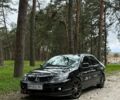 Черный Мицубиси Лансер, объемом двигателя 2 л и пробегом 245 тыс. км за 6800 $, фото 1 на Automoto.ua
