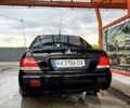 Чорний Міцубісі Lancer, об'ємом двигуна 1.6 л та пробігом 220 тис. км за 4200 $, фото 1 на Automoto.ua