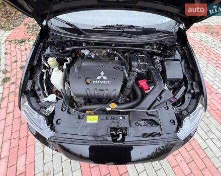 Черный Мицубиси Лансер, объемом двигателя 2 л и пробегом 217 тыс. км за 5500 $, фото 11 на Automoto.ua