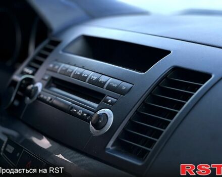 Чорний Міцубісі Lancer, об'ємом двигуна 2 л та пробігом 205 тис. км за 6500 $, фото 1 на Automoto.ua