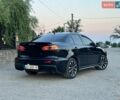 Черный Мицубиси Лансер, объемом двигателя 1.5 л и пробегом 285 тыс. км за 5899 $, фото 1 на Automoto.ua