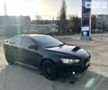 Чорний Міцубісі Lancer, об'ємом двигуна 2 л та пробігом 274 тис. км за 6900 $, фото 1 на Automoto.ua