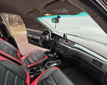 Черный Мицубиси Лансер, объемом двигателя 1.58 л и пробегом 254 тыс. км за 5000 $, фото 20 на Automoto.ua