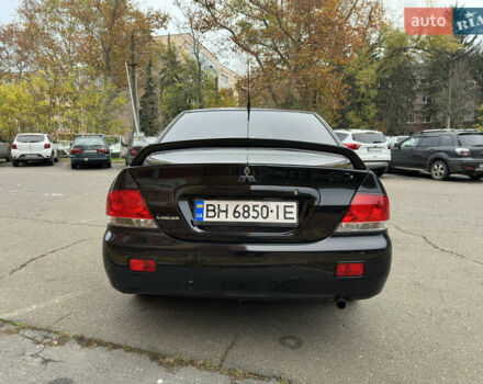 Чорний Міцубісі Lancer, об'ємом двигуна 1.58 л та пробігом 173 тис. км за 4700 $, фото 3 на Automoto.ua