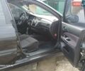 Черный Мицубиси Лансер, объемом двигателя 2 л и пробегом 286 тыс. км за 4000 $, фото 11 на Automoto.ua