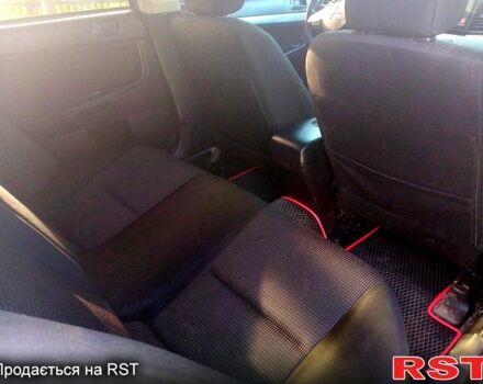 Чорний Міцубісі Lancer, об'ємом двигуна 2 л та пробігом 180 тис. км за 7300 $, фото 6 на Automoto.ua