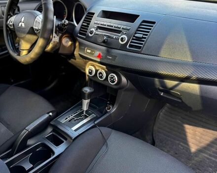 Черный Мицубиси Лансер, объемом двигателя 2 л и пробегом 224 тыс. км за 7000 $, фото 2 на Automoto.ua