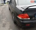 Черный Мицубиси Лансер, объемом двигателя 1.58 л и пробегом 180 тыс. км за 4500 $, фото 4 на Automoto.ua