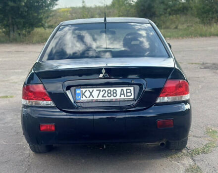 Мицубиси Лансер 2007 в Харькове на Automoto.ua Черный Мицубиси Лансер, объемом двигателя 1.58 л и пробегом 278 тыс. км за 3500 $, фото 4 на Automoto.ua
